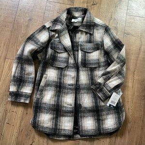 Brand new black and beige flannel jacket, New With Tags. Women’s Size Medium
